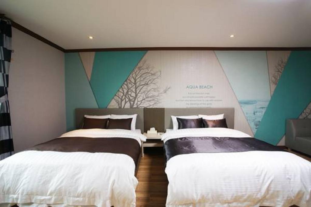 Seongsan Aqua Beach Hotel Согвипхо Номер фото