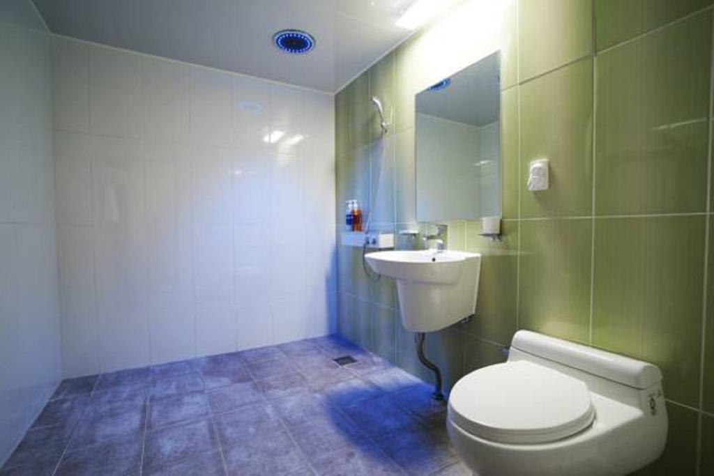 Seongsan Aqua Beach Hotel Согвипхо Номер фото